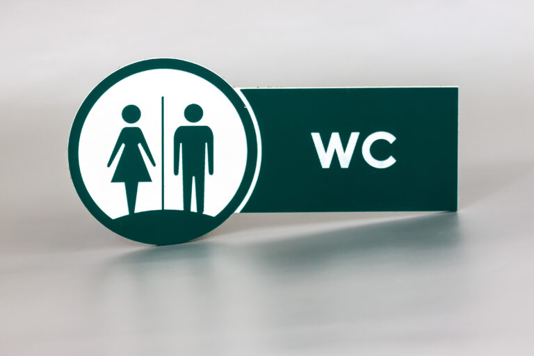 Znak WC z laminatu grawerskiego dwukolorowy